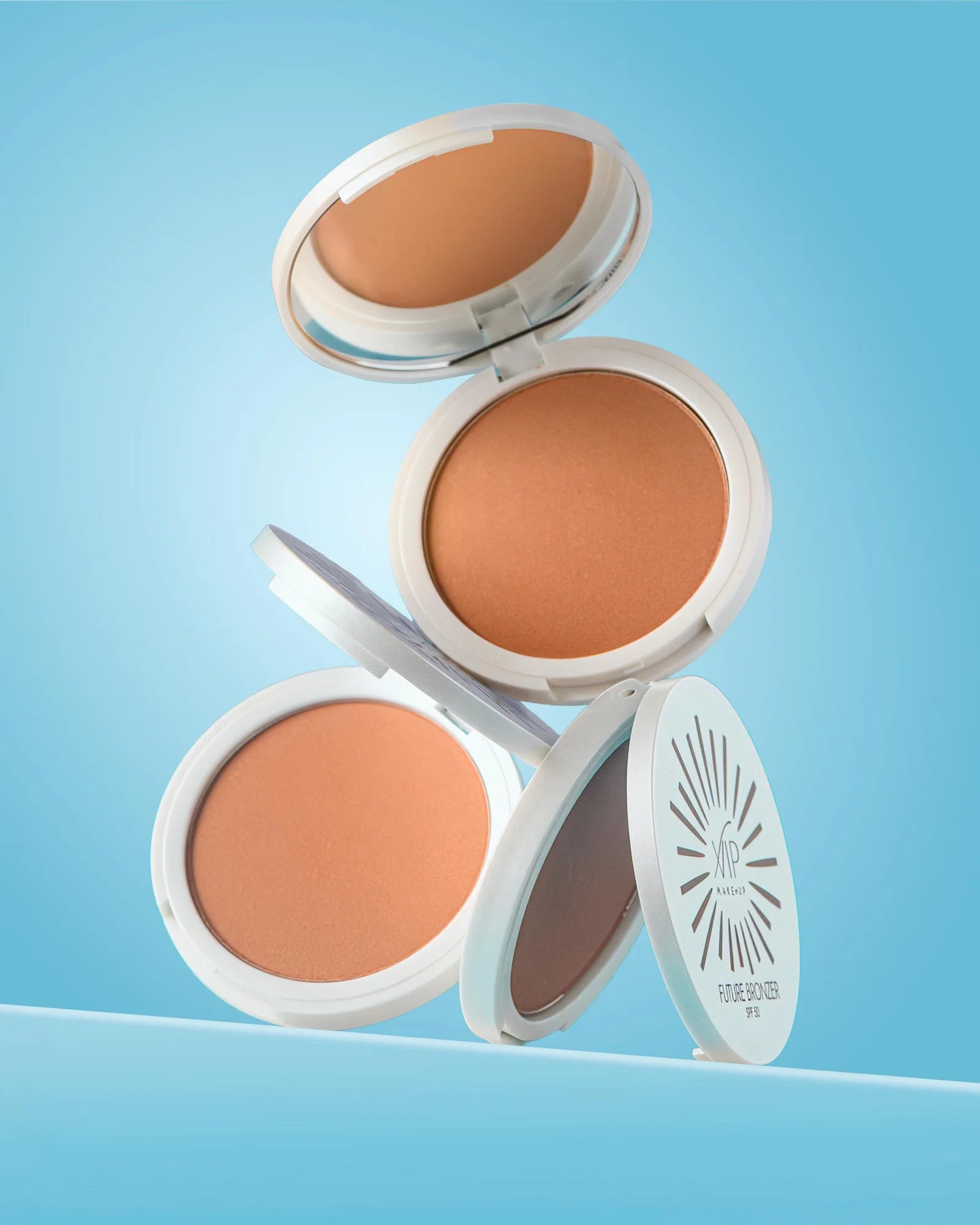 Terra abbronzante Future Bronzer SPF 50, tre cialde aperte con specchio